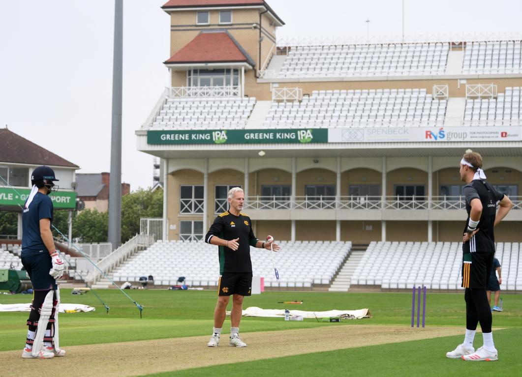 Broad and Root Nottinghamshire coach Peter Moores speaking with Joe Root and Stuart Broad