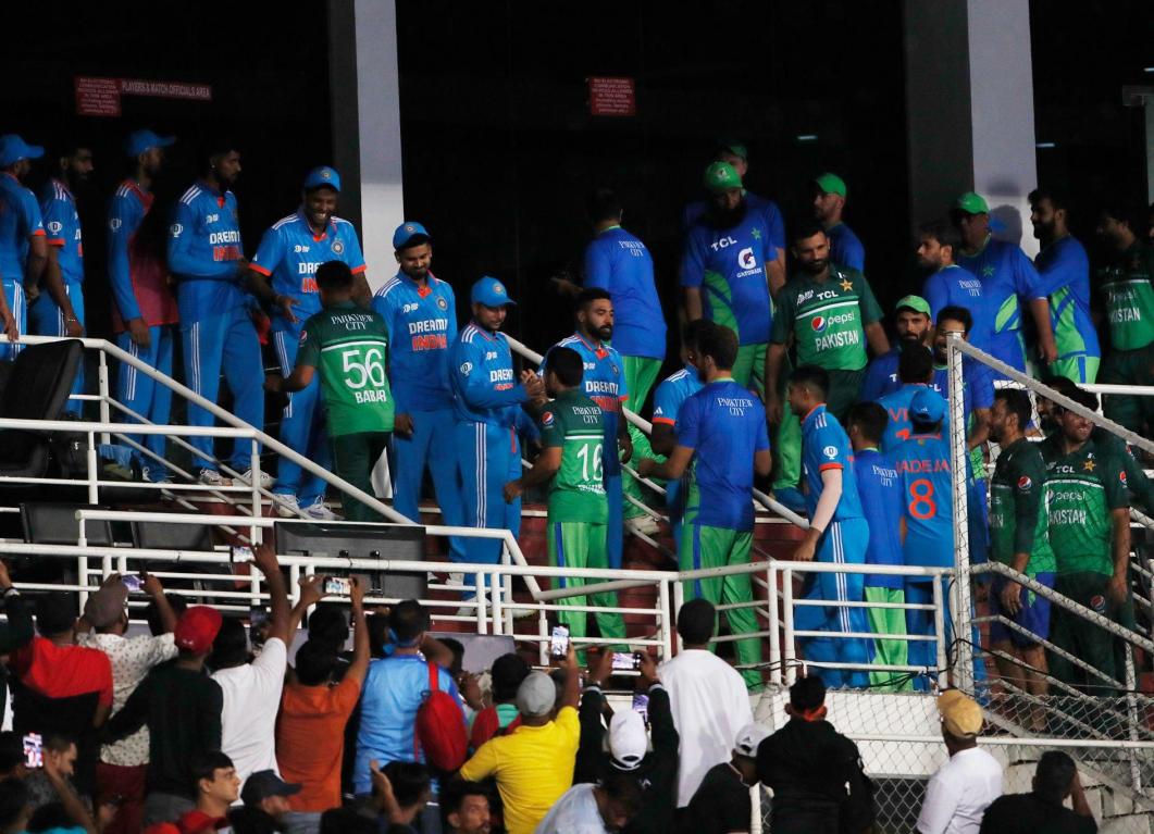 India and Pakistan share spoils in a rain-dampened encounter
