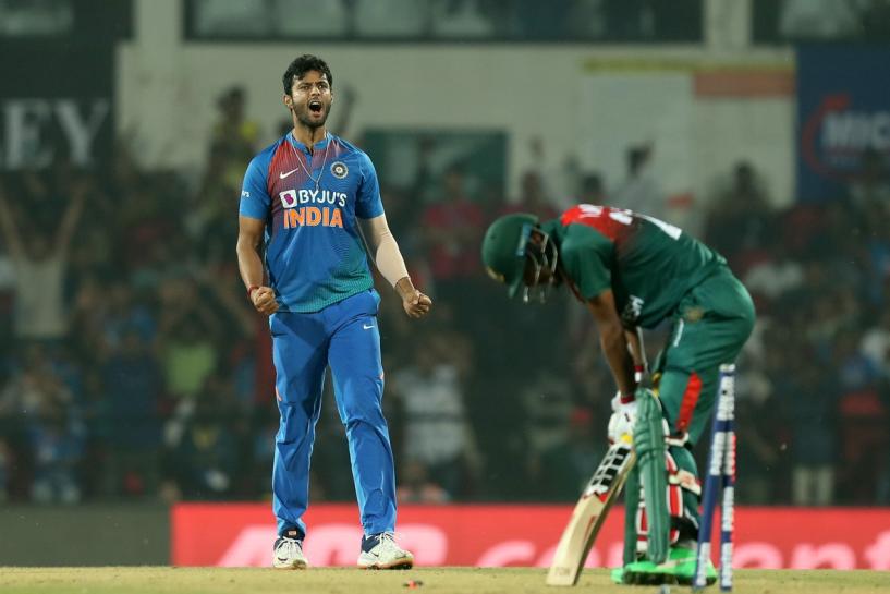 Shivam Dube after picking up the wicket